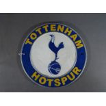 A circular cast iron Tottenham Hotspur wall plaque,