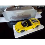 Minichamps - a 1:18 scale diecast model Porsche 918 Spyder,