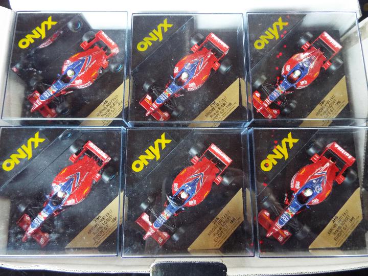 Onyx - 24 diecast model F1 racing cars with driver figures in square rigid transparent cases,