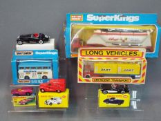 Matchbox, Crescent, Code Two Models - Seven boxed diecast model vehicles in various scales.