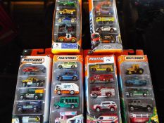 Matchbox on a Mission, Mattel six sealed packs each containing five model motor vehicles,