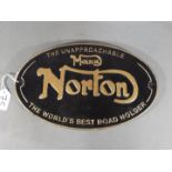 A cast iron oval Manx Norton wall plaque (ymcnm) approx 20 x 33 cm