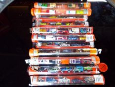 Matchbox Mattel Wheels - eleven tubes each containing five model motor vehicles,