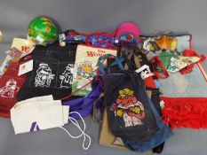 A collection of Wombles related items to include bags, a mat, a box and a ball.