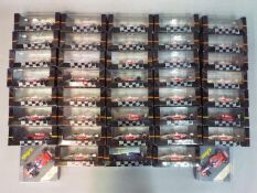 Onyx - A collection of 40 diecast model Indy Cars and F1 racing cars by Onyx.