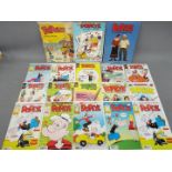 A collection of vintage Popeye comics, activity book and movie storybook.