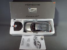 Dickie Spilzeug - A boxed remote controlled Porsche Carrera Gt by Dickie Spielzeug.