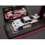 FLY, GB Track - Two boxed Slot Cars by Fly and GB Track.