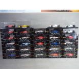 Onyx - 29 diecast models from the F1 and Indy Cars collections,