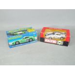 Scalextric - Two boxed Scalextric cars.