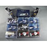 Minichamps - A collection of 10 1:43 scale diecast model F1 racing cars and 2 boxed 1:8 scale