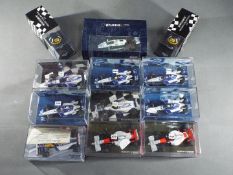 Minichamps - A collection of 10 1:43 scale diecast model F1 racing cars and 2 boxed 1:8 scale