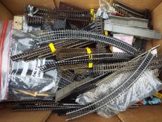 A good collection of OO gauge twin rail track and some scenics, station buildings, etc.