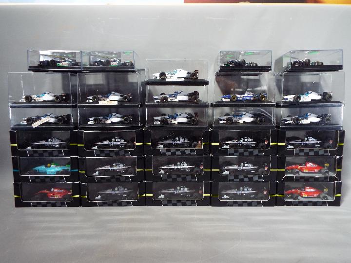 Onyx - 30 diecast model cars by Onyx from the F1 collection, models are contained in display boxes,