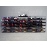 Onyx - 24 diecast model F1 cars by Onyx, contained in original display boxes.