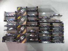 Onyx - 29 boxed diecast F1 racing cars by Onyx.
