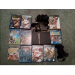 Vintage Gaming - a PlayStation 2 (PS2) with two controller's, eight PlayStation 2 games, one PS 3,