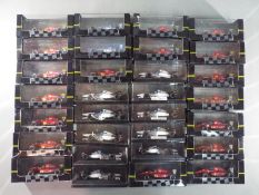 Onyx - 30 boxed diecast F1 racing cars by Onyx.