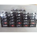 Onyx - 32 diecast models by Onyx from the F1 and Indy Car collections,