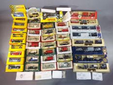 Lledo, Maisto - Approximately 50 boxed diecast model vehicles in various scales.