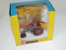 Corgi - a diecast model Massey-Ferguson Tractor 165 with Saw attachment # 73 appears mint in
