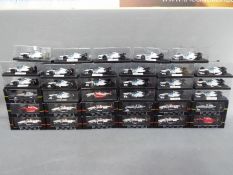 Onyx - 35 diecast models by Onyx from the F1 and Indy Car collections,