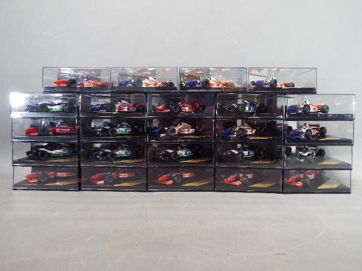 Onyx - 24 diecast model F1 cars by Onyx, models are contained in original display boxes.