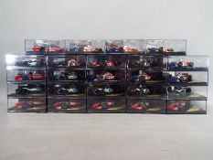 Onyx - 24 diecast model F1 cars by Onyx, models are contained in original display boxes.