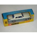 Corgi - a diecast model Rolls Royce Silver Shadow finished in pearlescent white over grey with blue