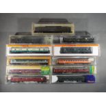 Hornby, Minitrix, Arnold, Roco - 11 N Gauge Passenger Coaches.