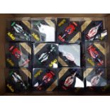 Onyx - 23 diecast model F1 racing cars with driver figures in square rigid transparent cases,