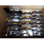 Onyx - 24 diecast model F1 racing cars with driver figures in rigid transparent cases,