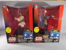 Star Wars - Two Thinkway Toys Star Wars Interactive Talking Banks, both contained in original boxes,