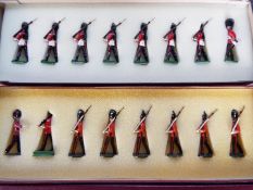 Harry Middleton Toy Soldiers - two boxed sets comprising Guards marching slope, fixed bayonets,