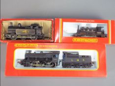 Hornby - Three boxed OO gauge locomotives. Lot consists of R300 0-4-0 Steam Locomotive Class OF Op.