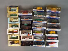 Dinky, Lledo, Onyx - A collection of 28 boxed diecast model vehicles in several scales.