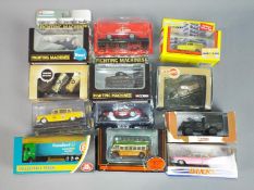 Corgi, EFE, Dinky and others - 12 boxed diecast model vehicles in various scales.