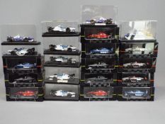 Onyx - 23 boxed 1:43 scale model F1 and Indy racing cars by Onyx.