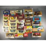 Matchbox, Corgi, Lledo, Vanguards - In excess of 30 diecast model vehicles in various scales.