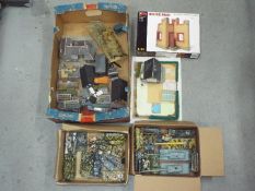 A collection of over 20 scenic accessories and building suitable for model railway / military