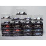 Onyx - 21 boxed 1:43 scale model F1 and Indy racing cars by Onyx.