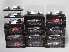 Onyx - 16 boxed 1:43 scale model F1 and Indy racing cars by Onyx.