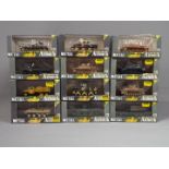 Armour Collection - A battalion of 12 boxed diecast model fighting vehicles by Armour Collection in
