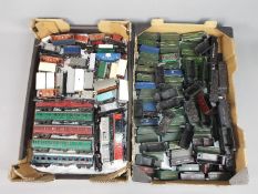 Triang, Hornby and Others - In excess of 50 OO gauge items of rolling stock,
