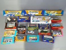 Matchbox, Corgi, EFE and others - 21 boxed diecast vehicles in several scales.