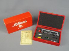 Schuco - A boxed Limited Edition Schuco Piccolo 40 Year Set containing Car Transporter and five