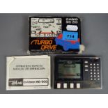 Casio - A boxed vintage Casio MG-200 Turbo Drive Calculator / Game.