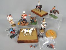 A small collection of seven unboxed painted white metal soldiers of various scales predominately