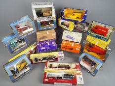 Corgi, Ertl, Rio, Classix Lledo - 20 boxed diecast model vehicles in a variety of scales.