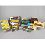 Corgi, EFE, Matchbox, Vanguards - 17 boxed diecast vehicles in various scales.